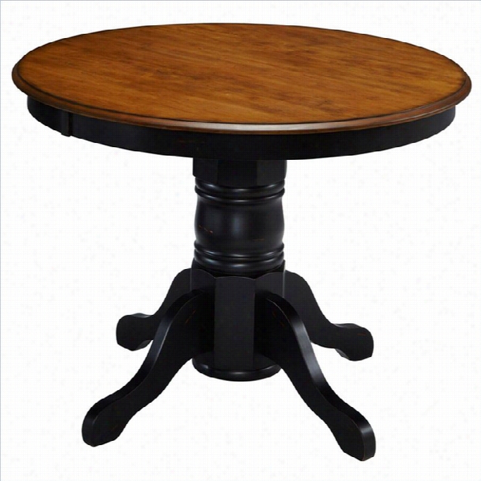 Home Styles French Countryside Pedestal  Table In Oak And Rubbed Blaack