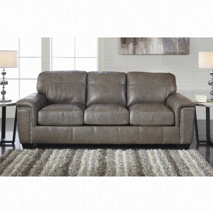 Ashley Donnell Leather Sofa In Granite