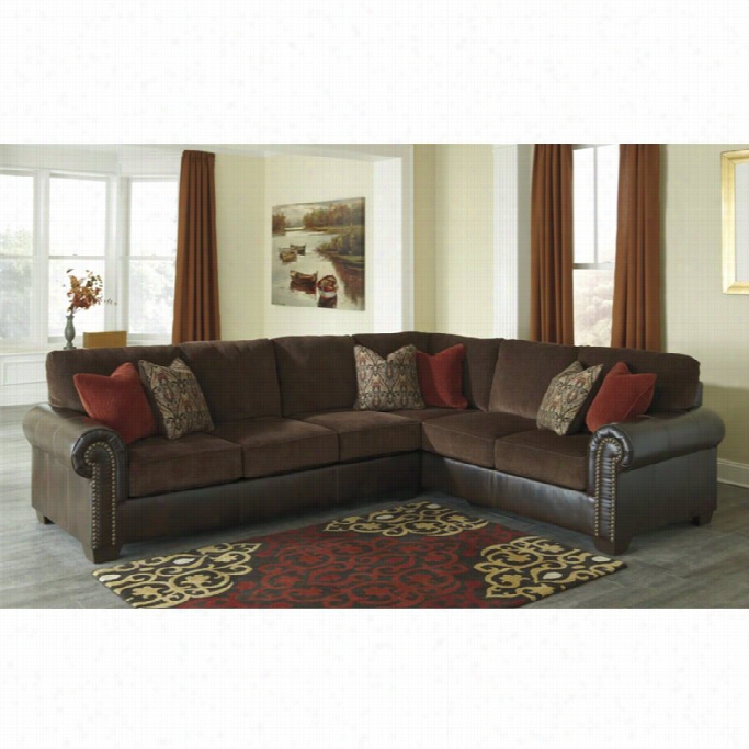 Ashley Arlette 2 Piece Faux Leather Sectional In Truffle