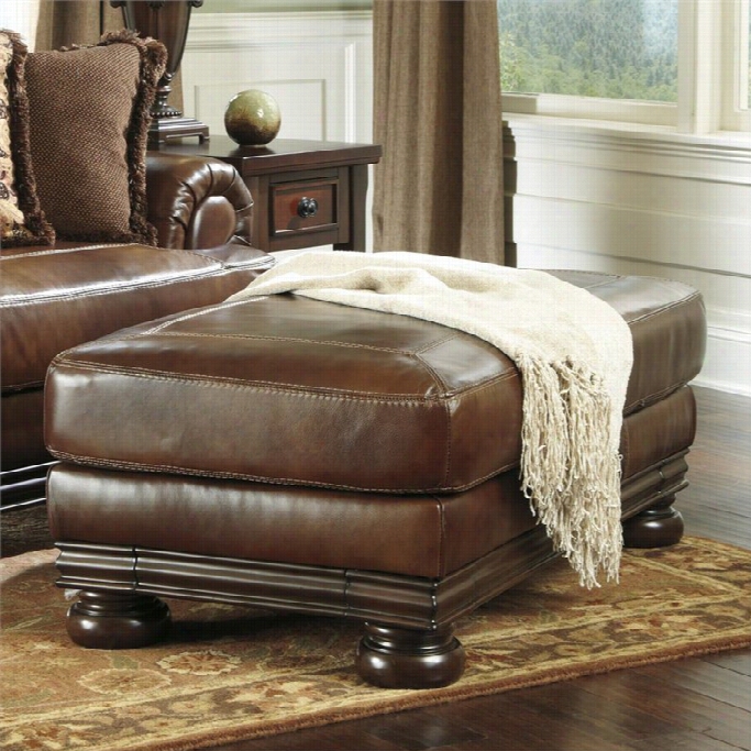 Ashley Furniture Hutcherson Leather Ottoman In Hraness