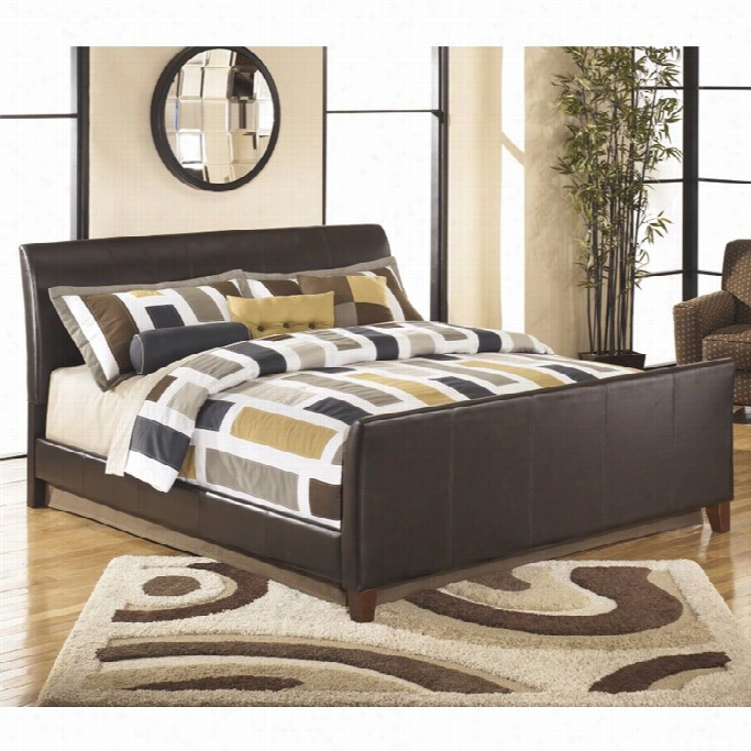 Ashley Stanwickl Eather Upholstered California King Bed In Brown
