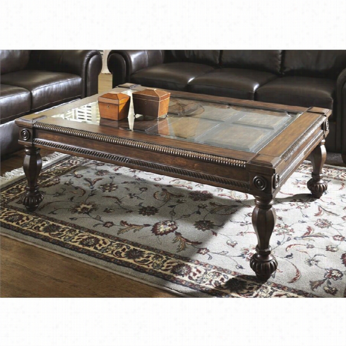 Asjley Mwntera Cofffee Table With Glass Insert In Dark Rustic Brown