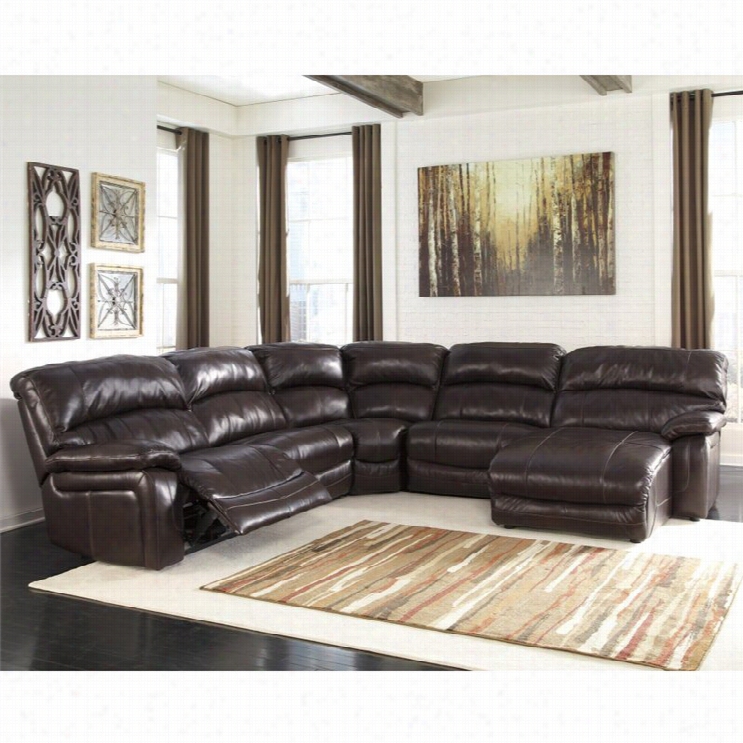 Ashley Furniture Damacio Leather Reclining Seectional In Brown