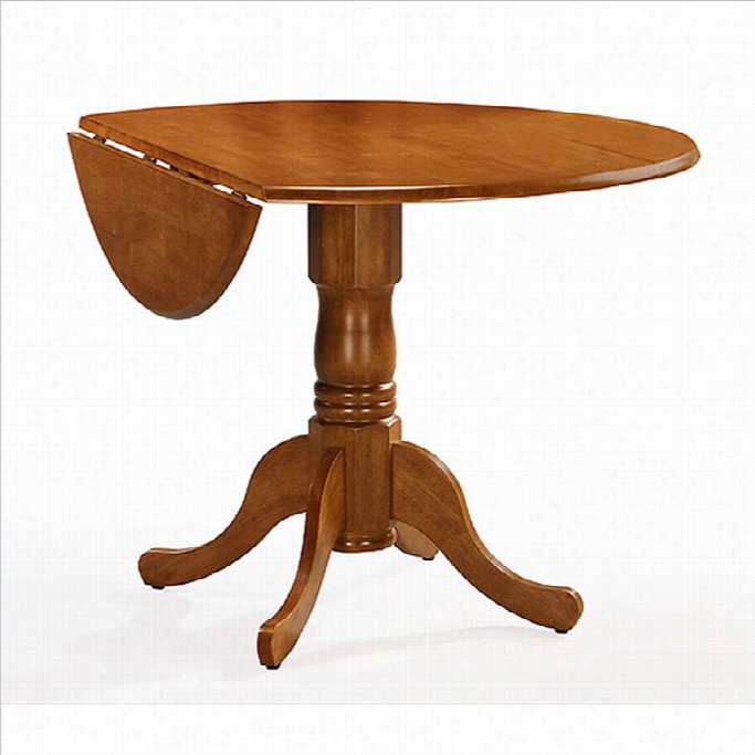 International Concepts - Round 42 Dual  Drol Leaf Dining Table In Oak Finish