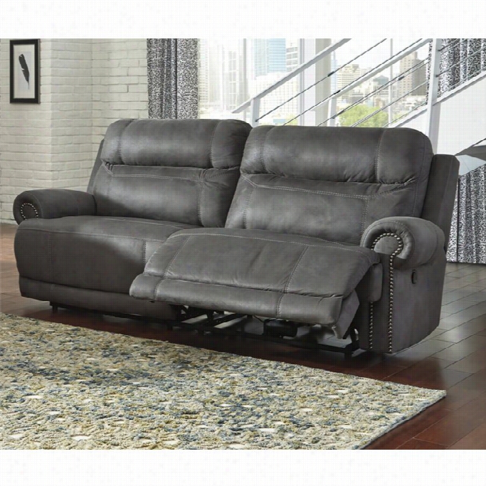 Ashley Furniture Austere Faux Leather Recliming Sofa In  Gray