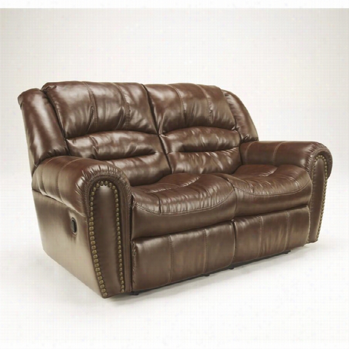 Ashley Wesley Faux Leatehr Reclining Loveseat In Sedona