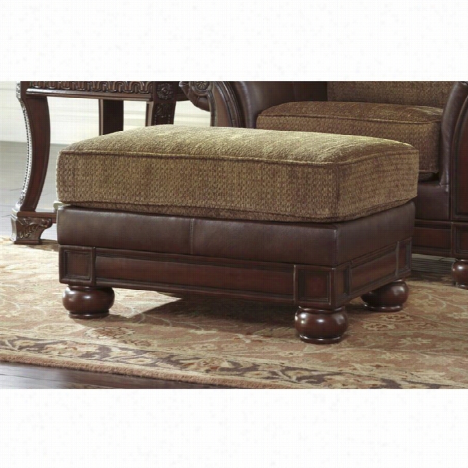 Ashley Beamerton Heights Texture And Faux Leather Ottoman Inchestnut