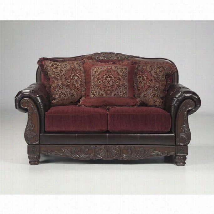 Ashley Weslynn Place Fuax Leather Loveseat In Burgundy