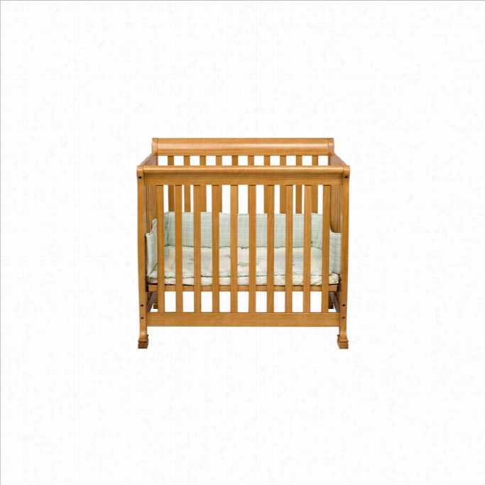 Davinci Kalani Convertible Mini Wood Crib In Honey Oak Finish