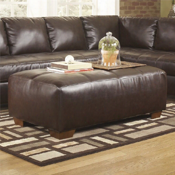 Ashley Equipage Fairplay Leeather Accent Ottoman In Mahogany