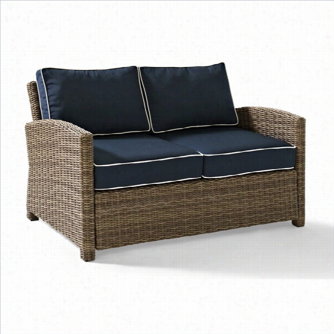 Bradent On Outdoor Wicker Loveseat With Navy Cushions