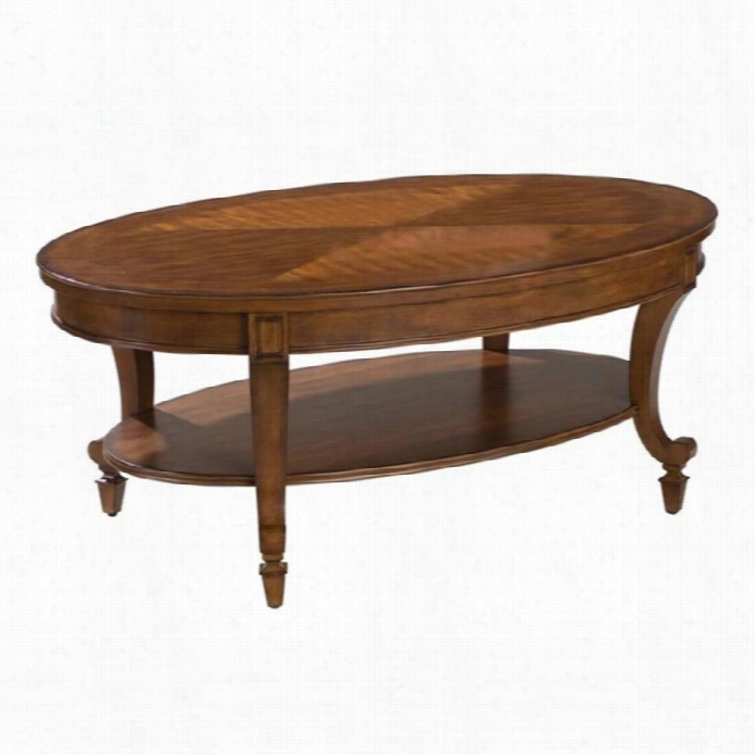 Magnussen Aidan Oval Cocktail Table In Cinnam On Brown